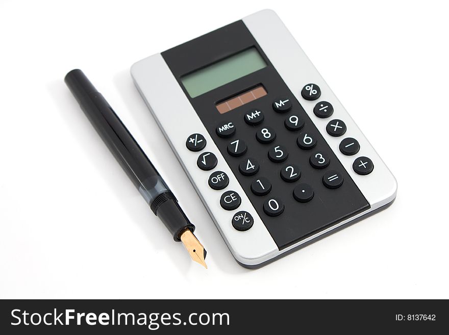 Fountain pen and hand calculator on white background