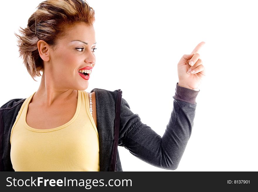 Side pose of young model against white background