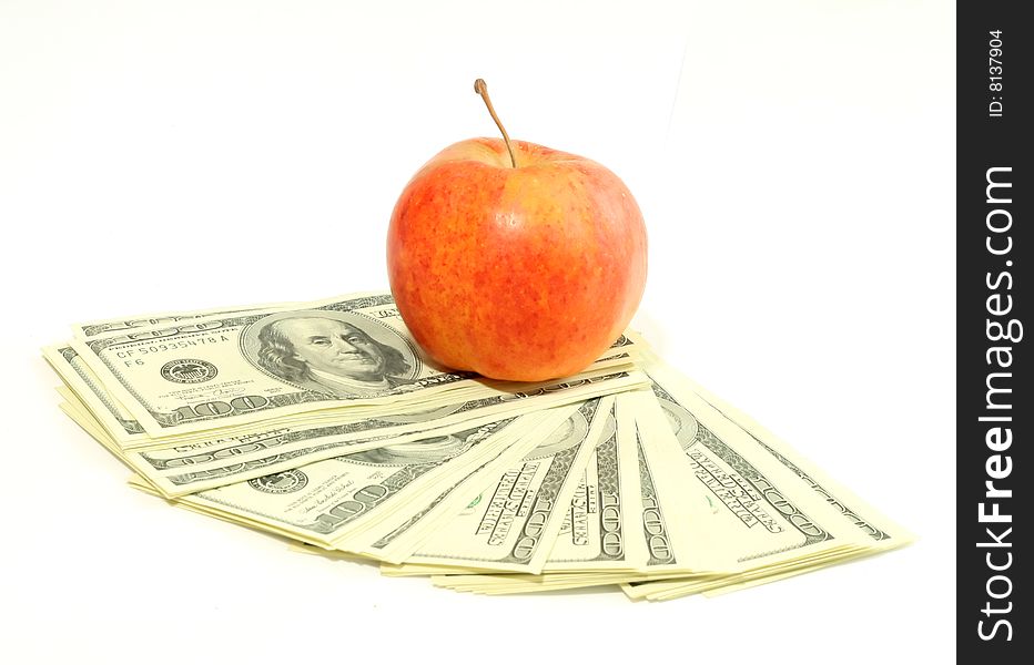 Banknotes Of Dollars And Apple Isolated On A Whit