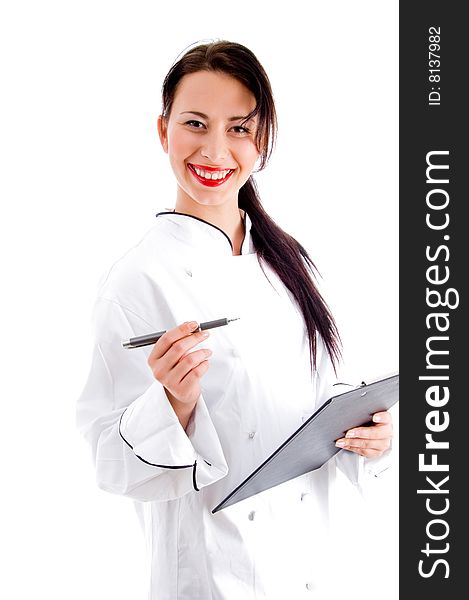 Female chef writing down the menu on an isolated white background