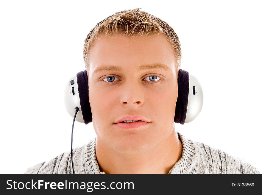 Face of man listening to music on an isolated background