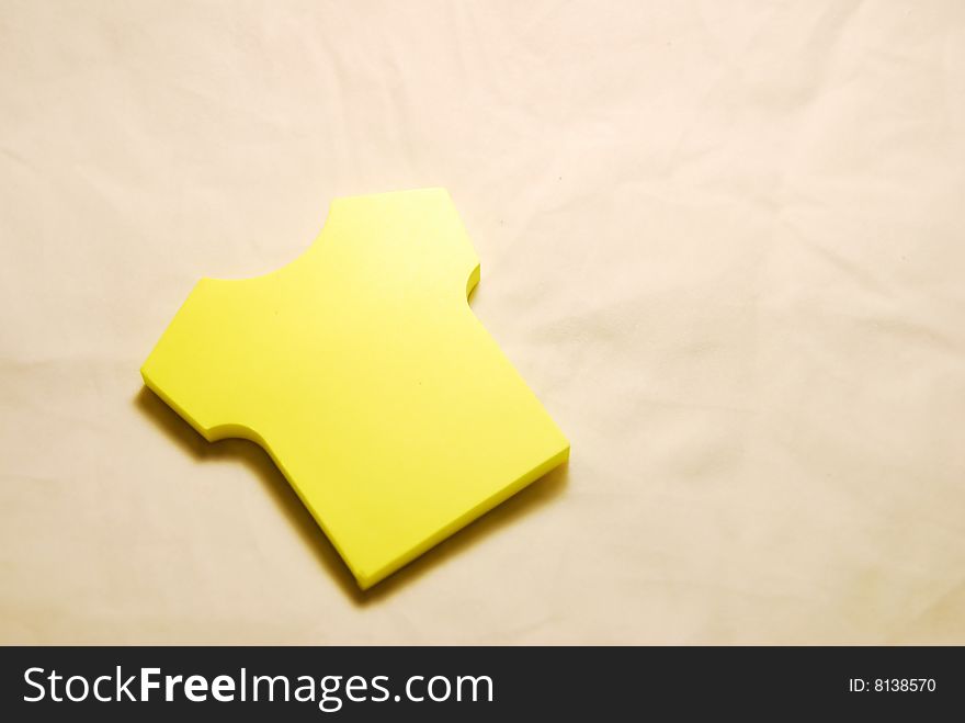 Note paper on yellow background.