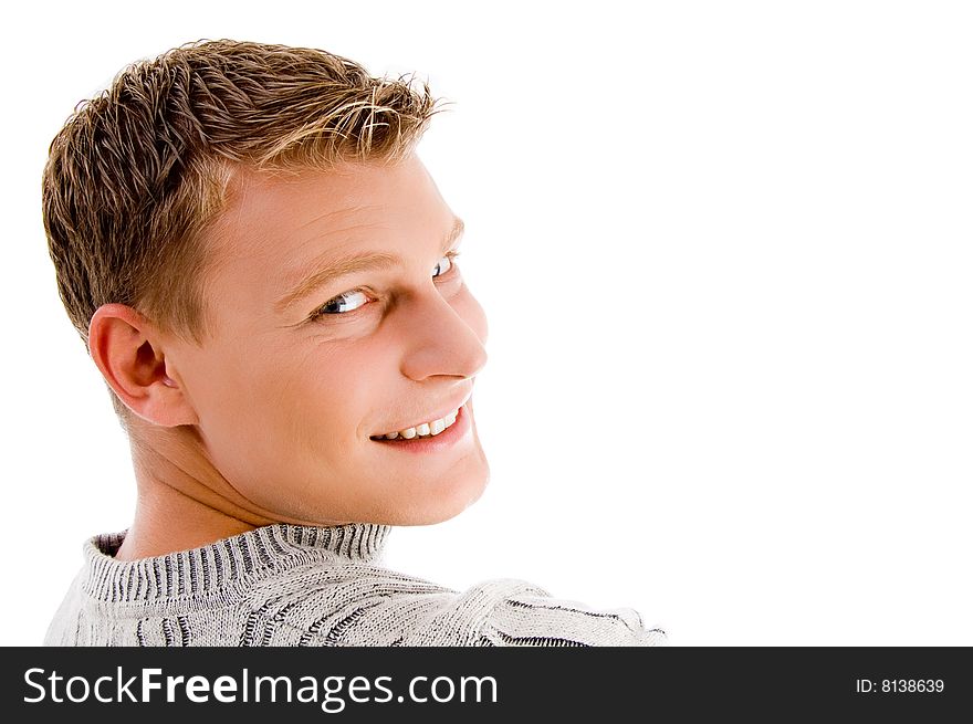 Smiling man looking backward on an isolated background