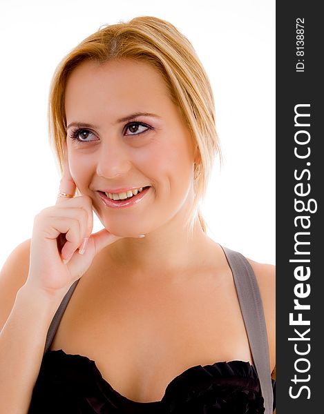 Smiling female holding her face on an isolated white background