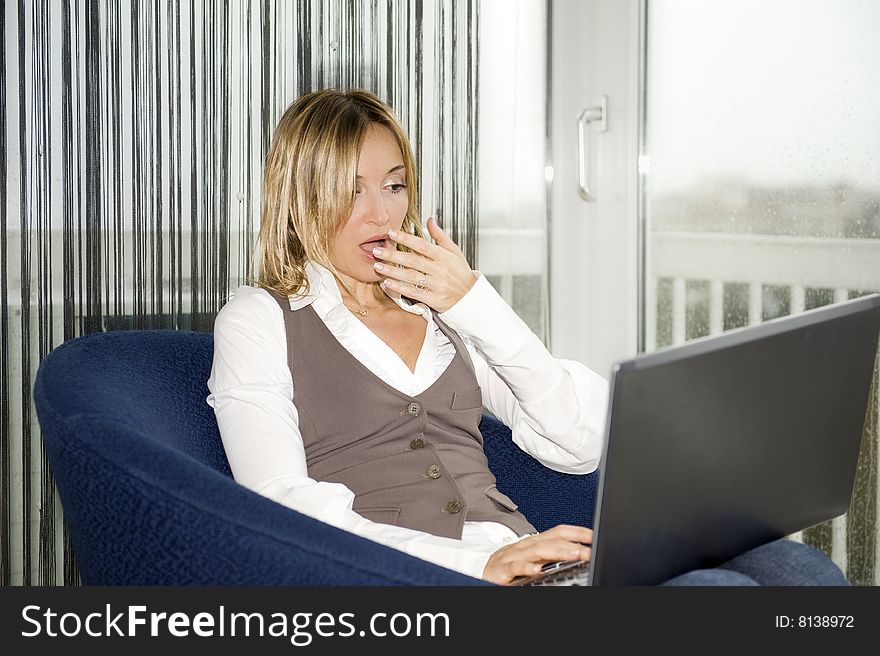 Beautiful businesswoman working at home