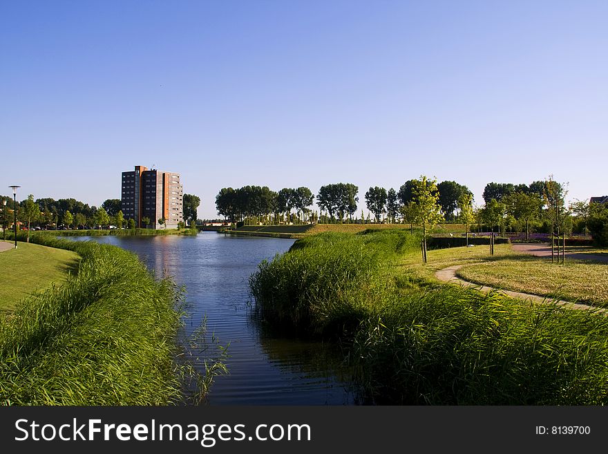 A view over a small lake inside a neighbourhood. A view over a small lake inside a neighbourhood