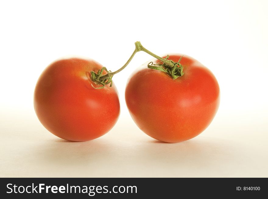 Tomatoes isolated on white background with clipping path. Tomatoes isolated on white background with clipping path.