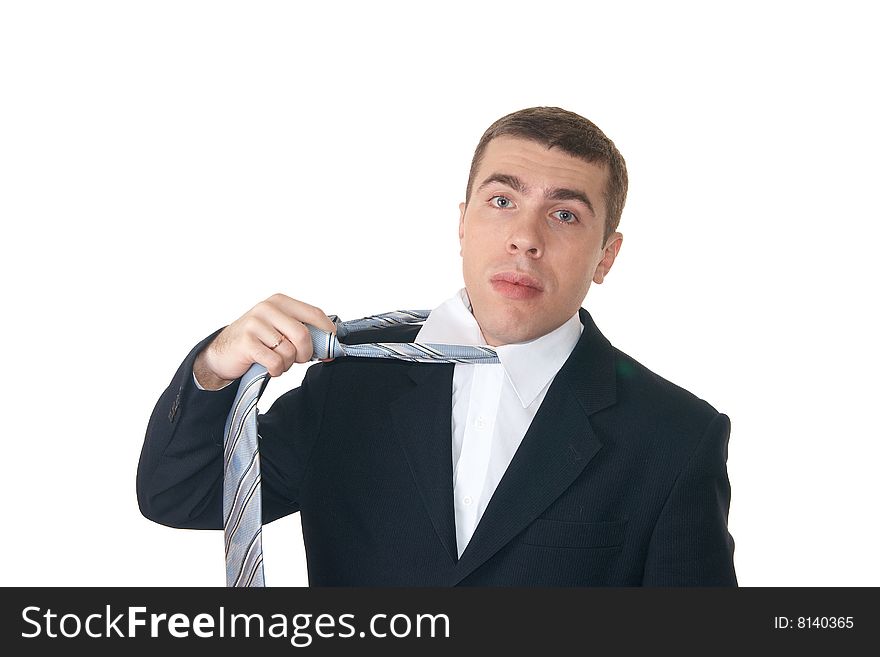 Thoughtful young man on the white background