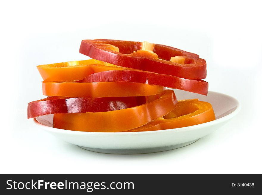 Capsicum pepper slices on a plate. Capsicum pepper slices on a plate