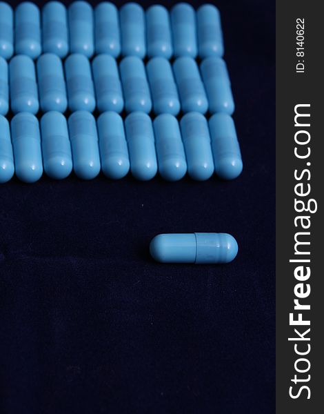 Medicine, a lt of blue tablets