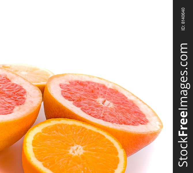 Slices of an lemon, orange and grapefruit closeup