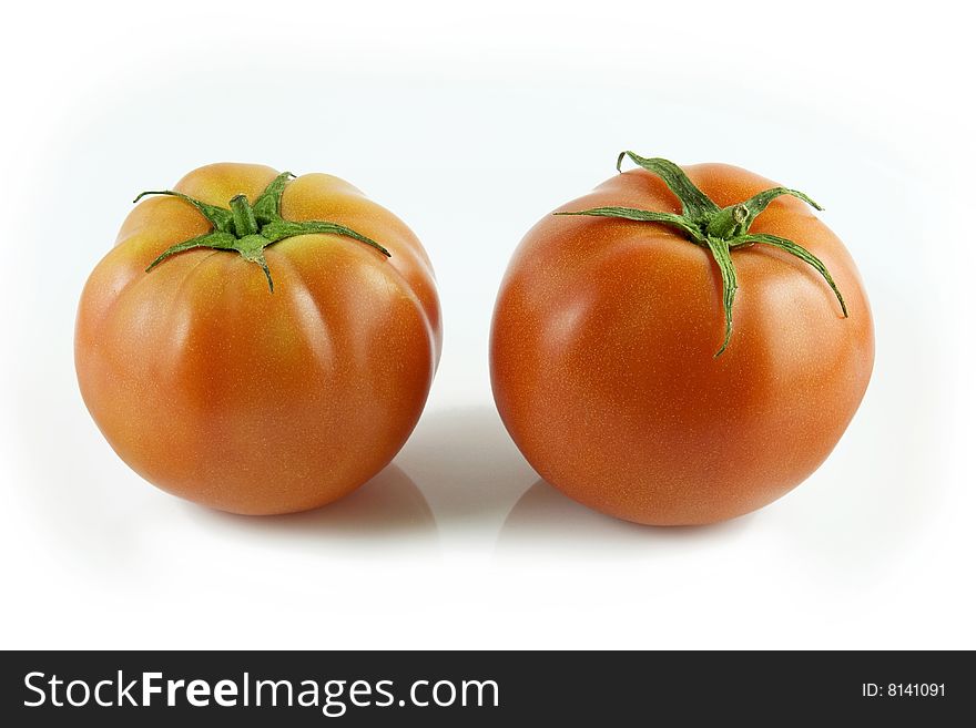 Red tomatoes on white background. Red tomatoes on white background