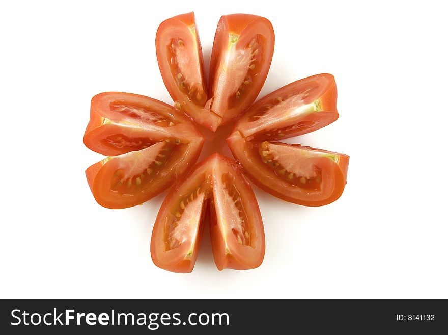 Tomato cut pieces on white background