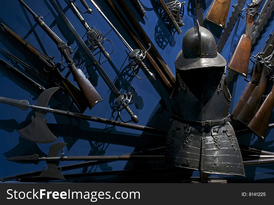 Armour and weapons with blue background