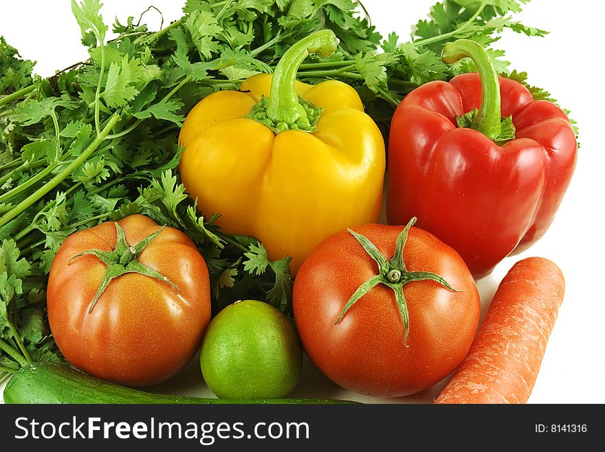Fresh vegetables with leaves in white background