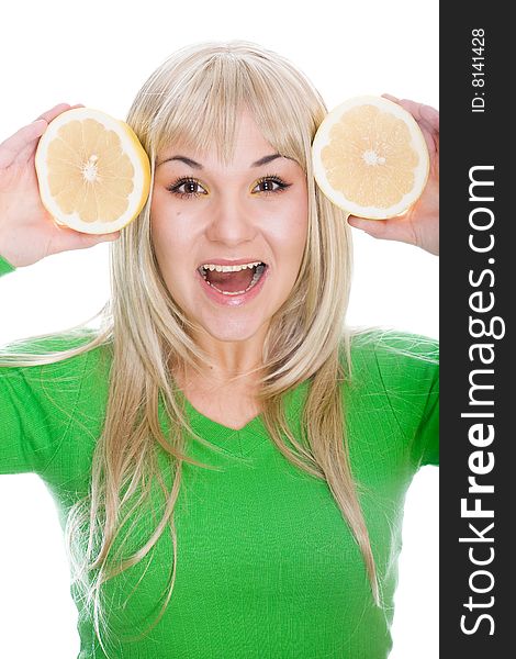 Attractive blonde woman with grapefruit on white