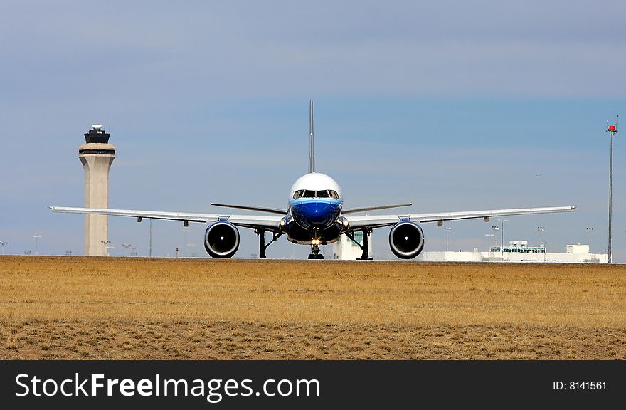 Head on view of large commercial jet on runway. Head on view of large commercial jet on runway