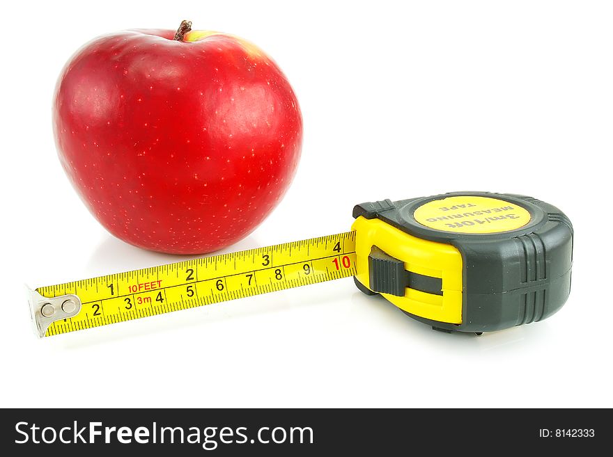 Bright red apple and measuring tape isolated on a white background