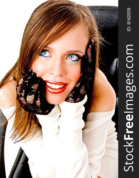 Close up of smiling female looking up on an isolated white background