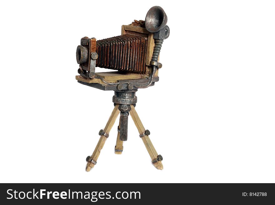 Model of old photographic camera on white background. Model of old photographic camera on white background