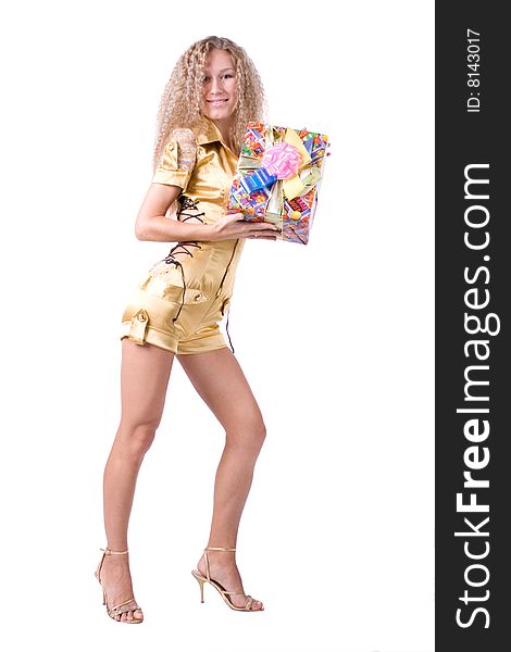 The young beautiful girl with a gift box on a white background. The young beautiful girl with a gift box on a white background