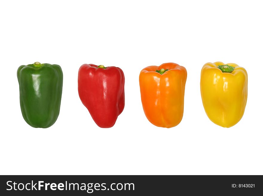 Four peppers in a line in the colors of green, red, orange and yellow, isolated over white background. Four peppers in a line in the colors of green, red, orange and yellow, isolated over white background.