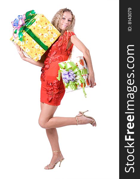 The young beautiful girl with a gift box on a white background. The young beautiful girl with a gift box on a white background