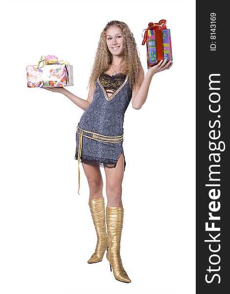 The young beautiful girl with a gift box on a white background. The young beautiful girl with a gift box on a white background