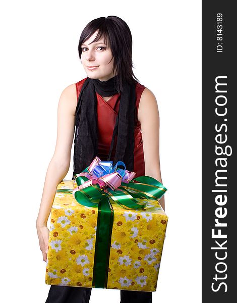 The young beautiful girl with a gift box on a white background. The young beautiful girl with a gift box on a white background