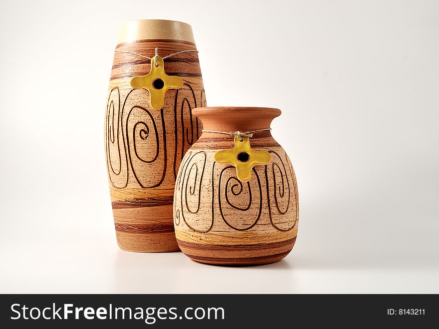 Couple of handmaded pots, isolated on a white background