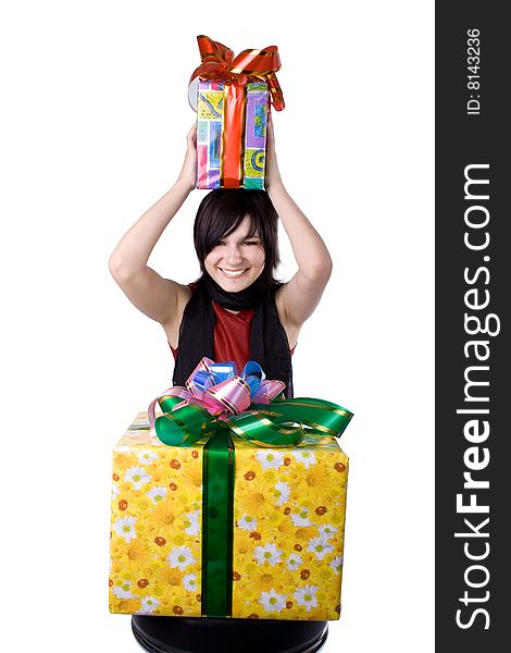 The young beautiful girl with a gift box on a white background. The young beautiful girl with a gift box on a white background