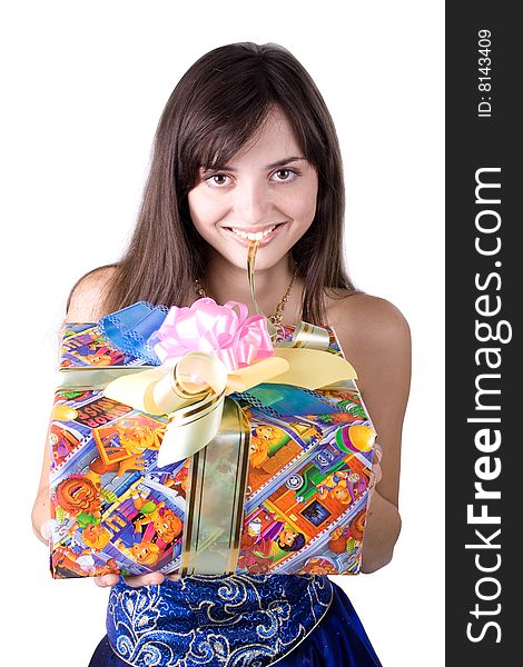 The young beautiful girl with a gift box on a white background. The young beautiful girl with a gift box on a white background