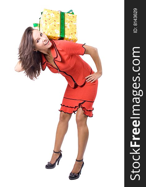 The young beautiful girl with a gift box on a white background. The young beautiful girl with a gift box on a white background