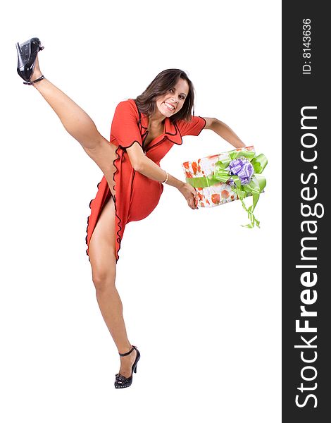 The young beautiful girl with a gift box on a white background. The young beautiful girl with a gift box on a white background