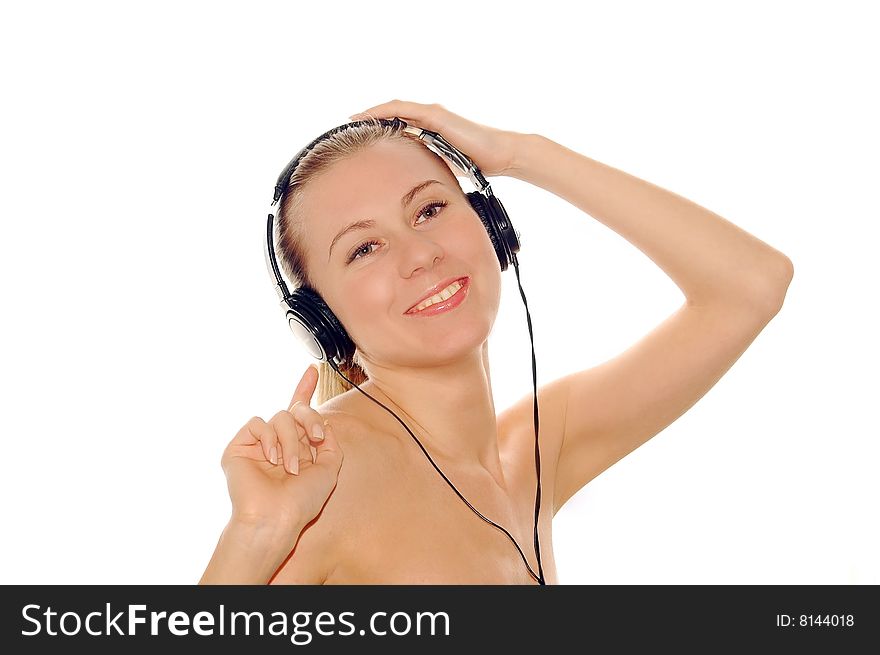 Portrait of happiness sexy young women with beautiful face in headphones and listening music on white. Portrait of happiness sexy young women with beautiful face in headphones and listening music on white