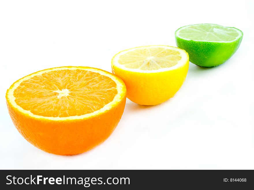 An arrangement of brightly colored citrus fruits. An arrangement of brightly colored citrus fruits