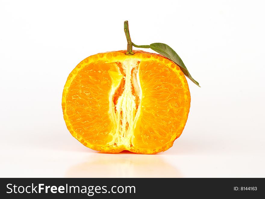 Orange with leaves on white background