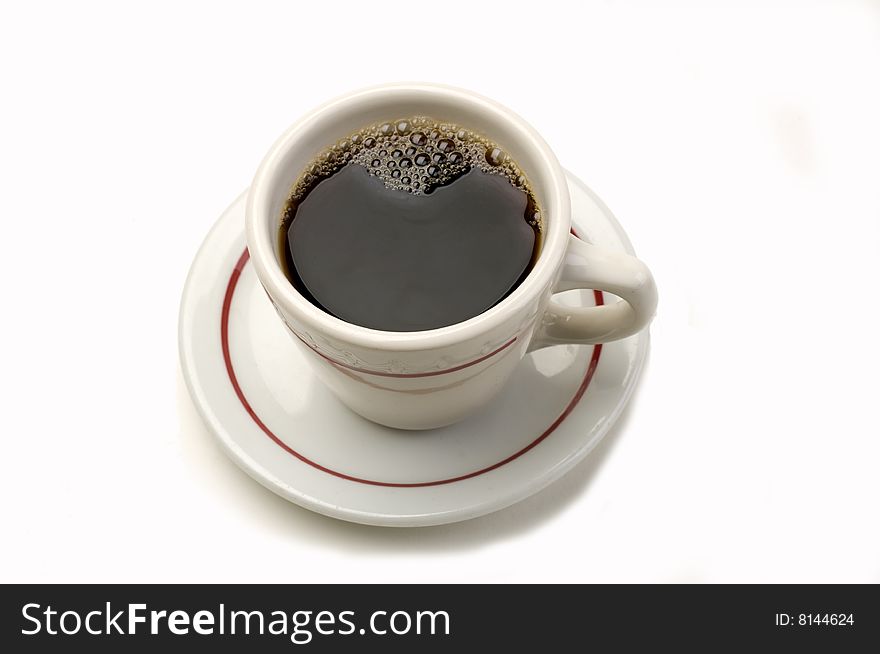 Coffee in a diner cup on a white background. Coffee in a diner cup on a white background