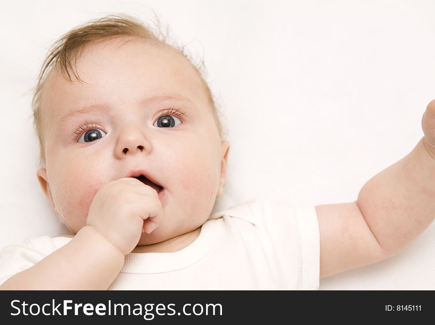 Little baby on a white background