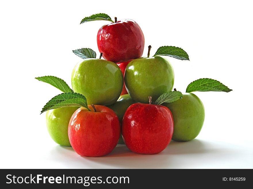 Red and Green apples in a shape of a pyramid on a white background. Red and Green apples in a shape of a pyramid on a white background