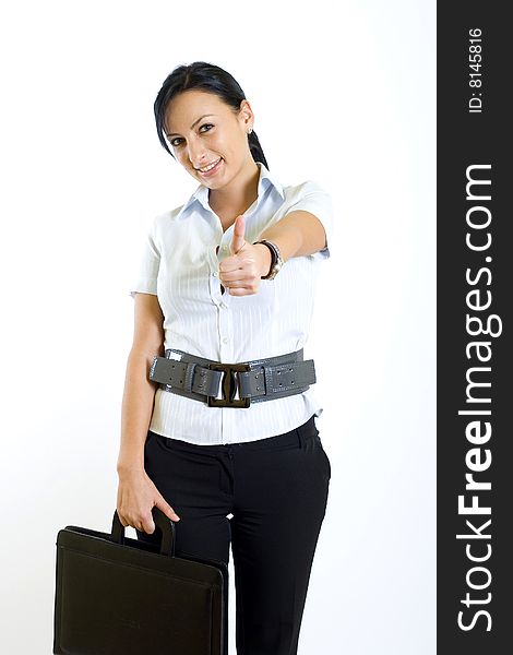 Businesswoman in a suit holds a black briefcase