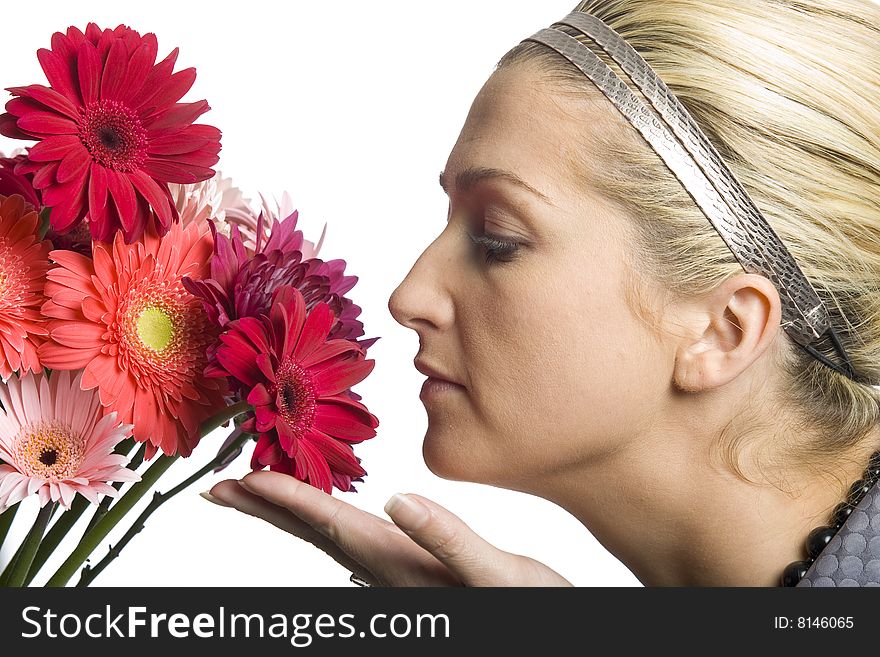 Girl Smelling Flowers