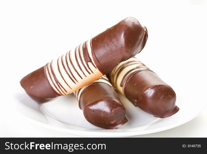 Rich mousse filled chocolate covered pastries. Rich mousse filled chocolate covered pastries