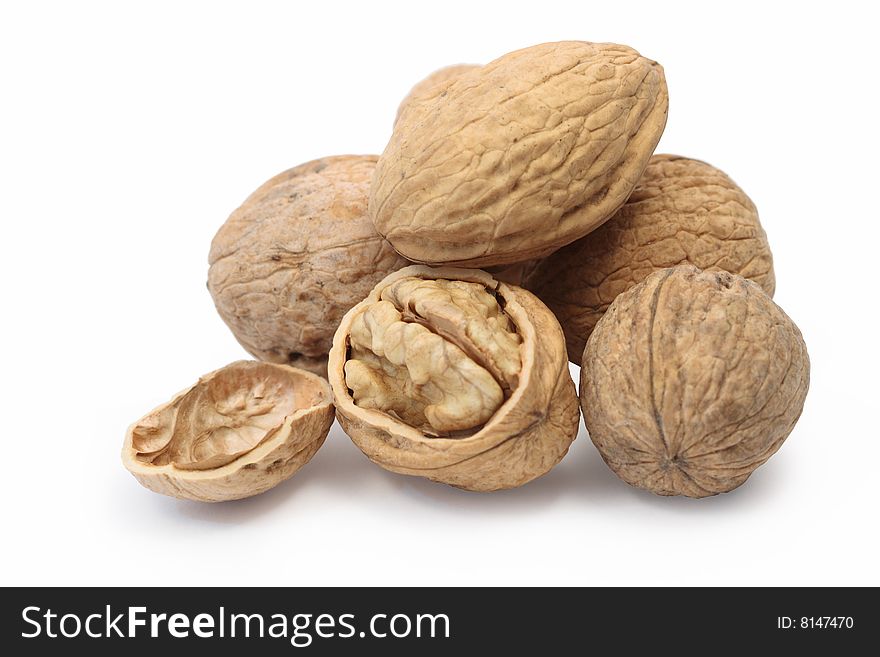 Lot of walnuts isolated on white background. Lot of walnuts isolated on white background