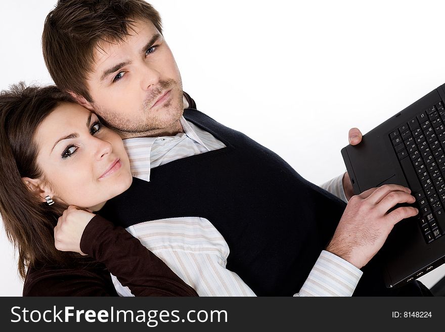 Stock photo: business theme: an image of beautiful couple with laptop. Stock photo: business theme: an image of beautiful couple with laptop