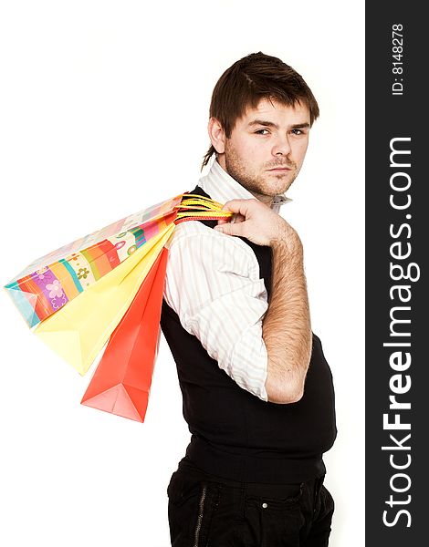 Stock photo: shopping theme: an image of a man with bags