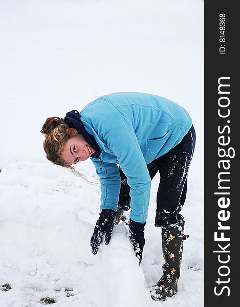 Teenage Girl Playing In Snow