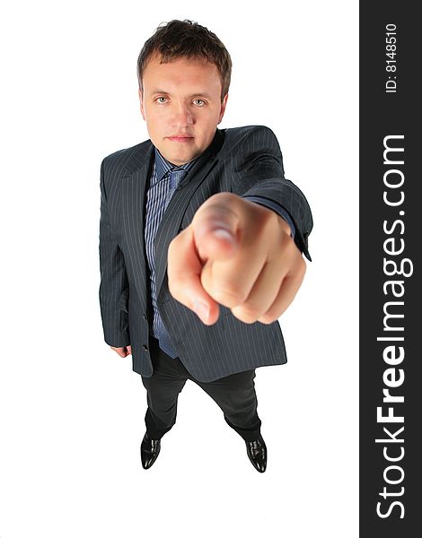 Man distorted by perspective points a finger at you. Man distorted by perspective points a finger at you