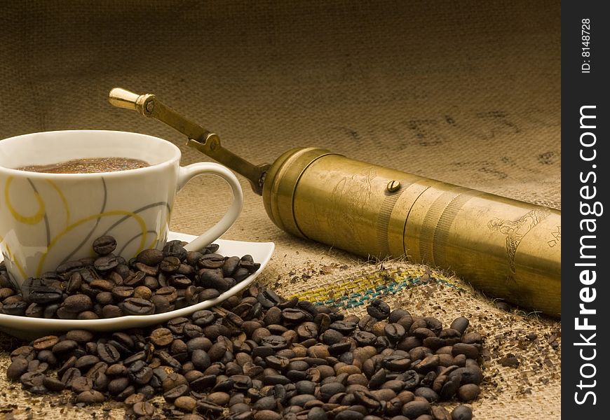 Hot coffee with coffee mill. Hot coffee with coffee mill