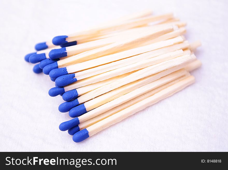 Blue matches on white background